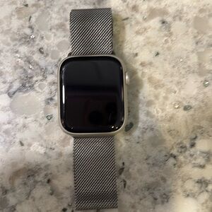 Apple Watch series 9 45mm watch with stainless steel band.